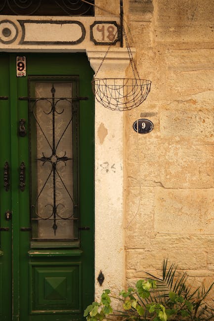 Green door with house number 9